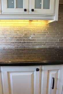  Black Galaxy Granite Countertop With Glass Backsplash And Under Cabinet Led Lighting
