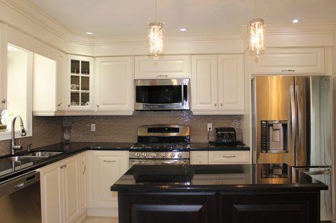   Transitional White Painted Kitchen With Dark Island