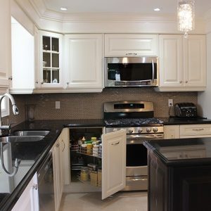  White Painted Kitchen With Magic Corner Pull Out