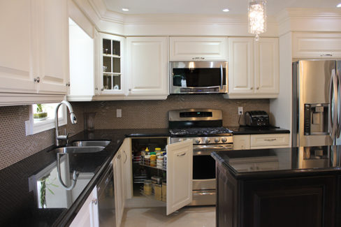   White Painted Kitchen With Magic Corner Pull Out