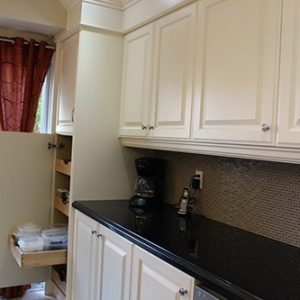  White Kitchen With Pull Out Pantry Drawers
