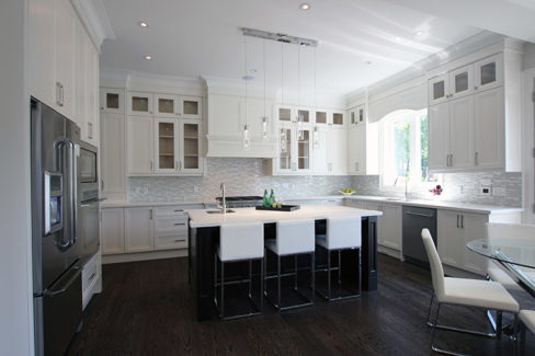 Custom designed kitchen. Double stack kitchen. Painted MDF kitchen with solid wood stained island. Built in appliances. Richmond hill 2015