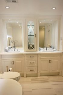 Bathroom renovation. Custom made high end vanity Double Sink from Bosco. Painted Off White cabinets doors. Modern white Quartz Counter Top. Designed and built by JK North York 2014.