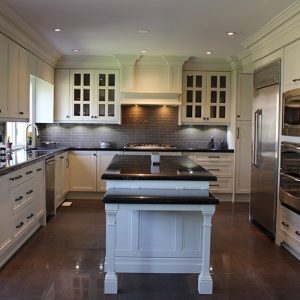   Transitional Painted Kitchen With Flat Panel Doors