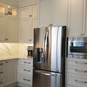 Transitional off white painted kitchen. nine feet ceiling, double stack cabinets. With riser and crown molding reaches to ceiling. Kitchen design and built by Joseph kitchen. Markham 2018.