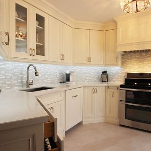 Condo kitchen make over by Joseph kitchen. Contemporary Off White Kitchen. Painted MDF Flat Panel. Designed and built by Joseph kitchen custom cabinetry. North York 2015