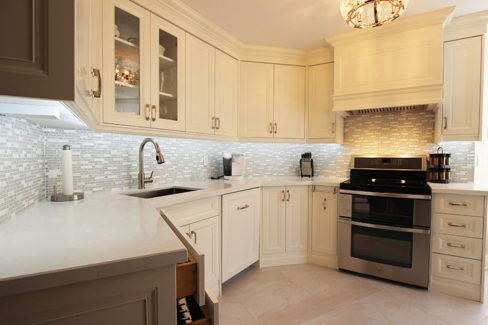 Condo kitchen make over by Joseph kitchen. Contemporary Off White Kitchen. Painted MDF Flat Panel. Designed and built by Joseph kitchen custom cabinetry. North York 2015