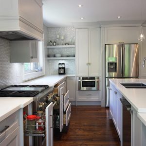 Kitchen renovation in Toronto and GTA. Off white painted kitchen. Built in appliances and Wine rack special design. Two sets of pantry to maximize the storage space in the kitchen. Solid wood dovetail joint drawers. European quiet close hinges. Spice rack pullouts and dovetail Drawers with Soft Close Hinges. Thornhill 2016