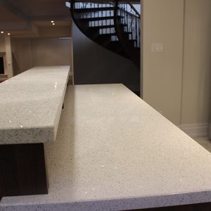  Two Level Kitchen Bar With White Double Edge Quartz Countertop