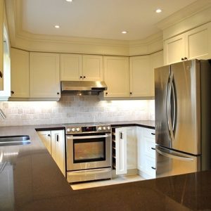   Transitional Kitchen With Brown Quartz Countertop
