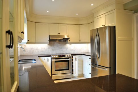   Transitional Kitchen With Brown Quartz Countertop