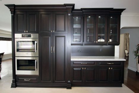  Dark Stained Wall Unit And Built In Double Stack Oven