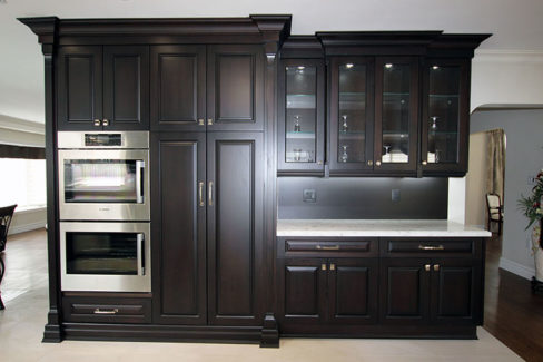  Dark Stained Wall Unit And Built In Double Stack Oven