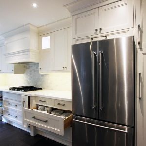 Custom cabinetry by Joseph Kitchen. Drawers and pull outs in base cabinets. Designed and built by JK.