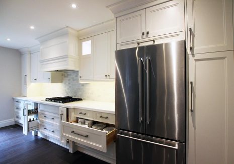 Custom cabinetry by Joseph Kitchen. Drawers and pull outs in base cabinets. Designed and built by JK.