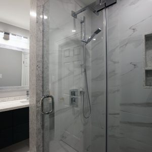 Bathroom renovation. Modern high gloss vanity. White and gray bathroom. Designed and built by JK and bath. Sep. 2018 North York.