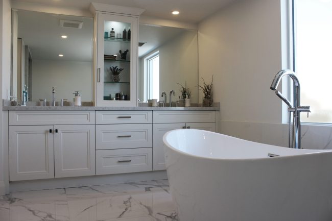 Bathroom remodeling Toronto. Custom made off white painted MDF, double sink vanity. Medicene box. Quartz countertop. Porcelaine floor. Design and whole renovation by JK.