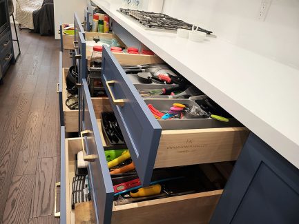 Custom cabinetry in Toronto Solid wood dovetail joint drawers Spice pull outs Automatic Europian soft close hardware Design and built by Joseph Kitchen and Bath custom cabientery . Kitchen design