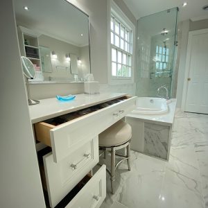 Custom made dressing table. Painted MDF and solid wood drawers. Soft close European hardware. Bathroom renovation in Whitby
