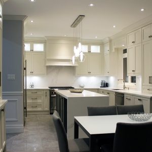 Kitchen renovation. Custom kitchen cabinets. Painted off white kitchen and gray island. Markham, summer 2019