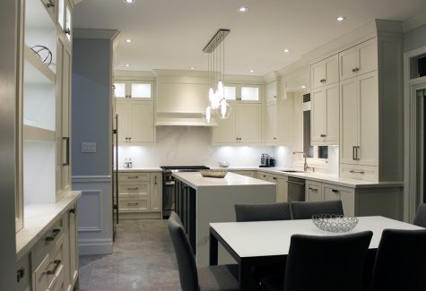 Kitchen renovation. Custom kitchen cabinets. Painted off white kitchen and gray island. Markham, summer 2019