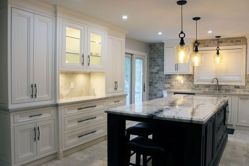 Custom designed kitchen cabinets. Solid wood framed painted kitchen. Pantry on the counter top. Glass doors to the wall unit area. Designed and built by JK 2017 Richmond Hill.