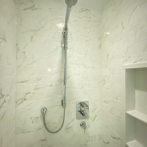 Full bathroom remodeling porcelain white and gray tiles. renovation in Whitby by Joseph Kithchend and bath