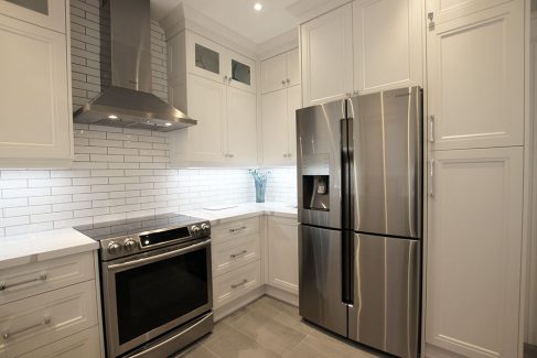 Double stack kitchen. Custom kitchen cabinets. Painted, white MDF kitchen cabinets. Build and design by JK 2019. Richmond Hill.