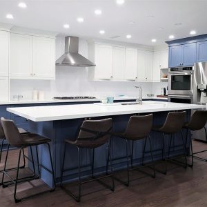 High end kitchen remodeling in Toronto Two tone modern kitchen cabinets. White and blue painted MDF cabinets White quartz countertop and back splash Conestructed in