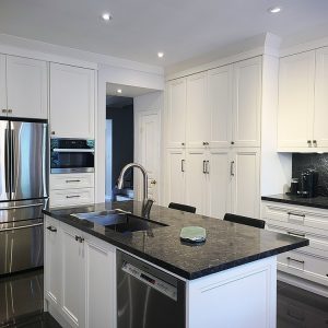 High end kitchen remodeling. Tall kitchen ceiling double stacked upper cabinets. Painted MDF white cabinets and dark quartz countertop. Off gold handles and knobs. Design and built by Joseph Kitchen and Bath 2021