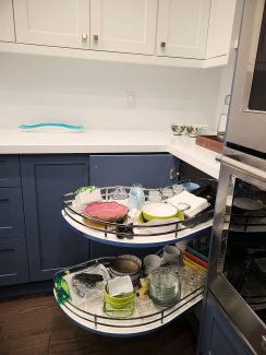 Kitchen accesories dead corner pull out European magic corner pull out Limanz corner pull out kidney shape corner pull out installed by Joseph kitchen and bath Toronto