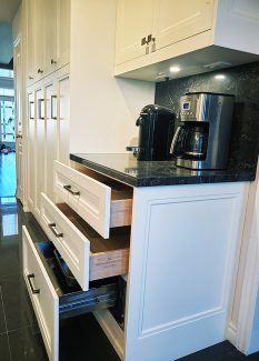 Kitchen pull outs and organizers. Solid wood drawers. Automatic European pull outs. Bottom section barbeque warmer. Design by JK Richmond Hill