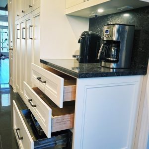 Kitchen pull outs and organizers. Solid wood drawers. Automatic European pull outs. Bottom section barbeque warmer. Design by JK Richmond Hill