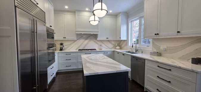 Kitchen remodeling by JK in Aurora tall ceilling and tall cabinets painted MDF, countertop from Cambria