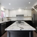 Kitchen remodeling in GTA Custom made two tone kitchen cabinets Solid wood painted in off white and staind in charochole Desing & Build by JK Markham