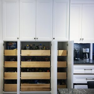 Kitchen remodeling in Richmond Hill. Pantry pull out. Solid wood drawers inside of the panty for the maximume of convenience. Design by JK