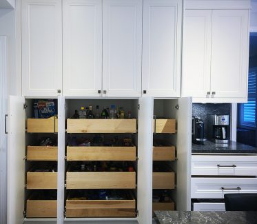 Kitchen remodeling in Richmond Hill. Pantry pull out. Solid wood drawers inside of the panty for the maximume of convenience. Design by JK