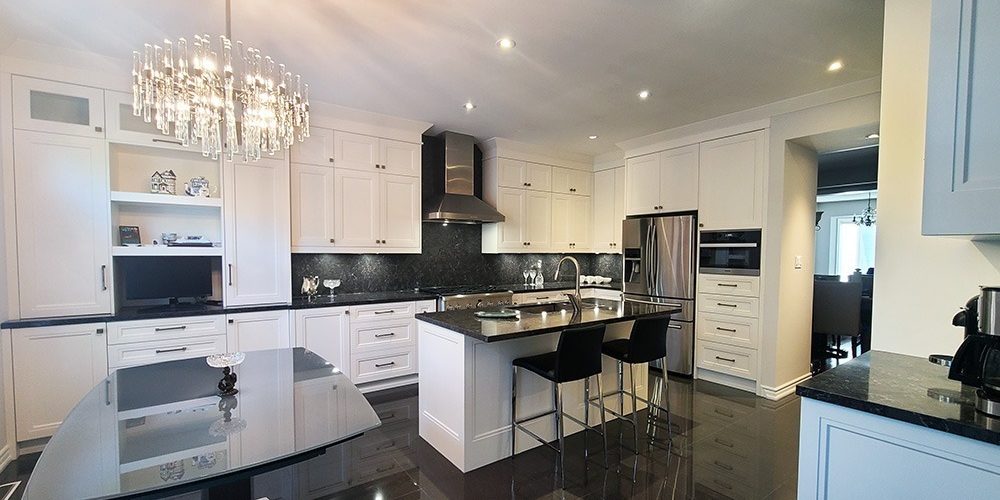 Kitchen renovation in Richmond Hill. A U shaped kitchen with island. Wall unit and pantery. Double stacked cabinets. Painted MDF. Quartz top. Kitchen renovation in Richmond Hill. A U shaped kitchen with island. Wall unit and pantery. Double stacked cabinets. Painted MDF. Quartz top.