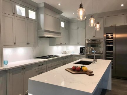 Kitchen renovation in Toronto Transitional painted MDF white kitchen cabinets Built in appliances cabinets Kitchen design and built by Joseph Kitchen.