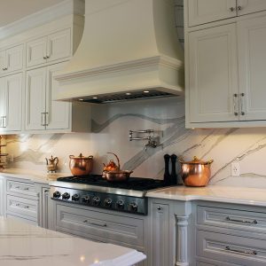 Classical kitchen design. Solid wood framed kitchen cabinets. Bell shaped mantel hood. Design and build by JK 2019 Markham