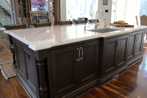 Large solid Canadian maple wood island. Sink on the island. Cambria quartz stone from marble collection. Built and design by Joseph kitchen. North York 2019