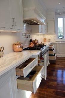 Kitchen design and renovation. Spice pull outs and solid wood pot drawers. Built and design by Jk North York 2019