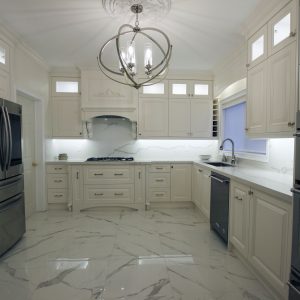 Full kitchen renovation. Design and build by JK. Painted off white kitchen cabinets. Double stack cabinets. Built in appliances. Toronto 2019