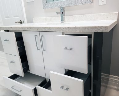 High gloss white and gray, modern vanity. Designed and built by JK and bath. Oct. 2018 North York.