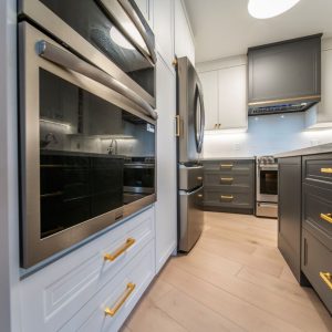 Transitional two tone kitchen cabinets. Painted MDF manufactured by JK . Quartz countertop and backsplash, Thornhill. Kosher kitchen