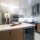 Custom made modern kitchen in Toronto Kitchen remodeling and renovation in Toronto- Two tone modern kitchen. Flat painted MDF in white and modern slim Shaker Oakwood cabinet doors. Quartz countertop and backsplash from LG Calacatta collection. Tall ceiling kitchen design. Design by JK 2023