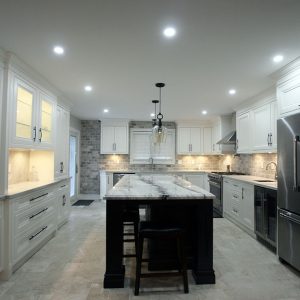 High-end, custom made contemporary solid wood kitchen. All doors are inside a fame. Painted in off white with Benjamin more colors. Island is solid wood stained to dark brown. Designed and built by JK 2017 Richmond Hill.