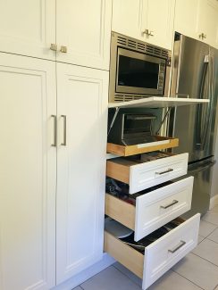 Custom cabinetry by Joseph Kitchen. Pull outs, solid wood drawer and pull out toaster. Markham 2018