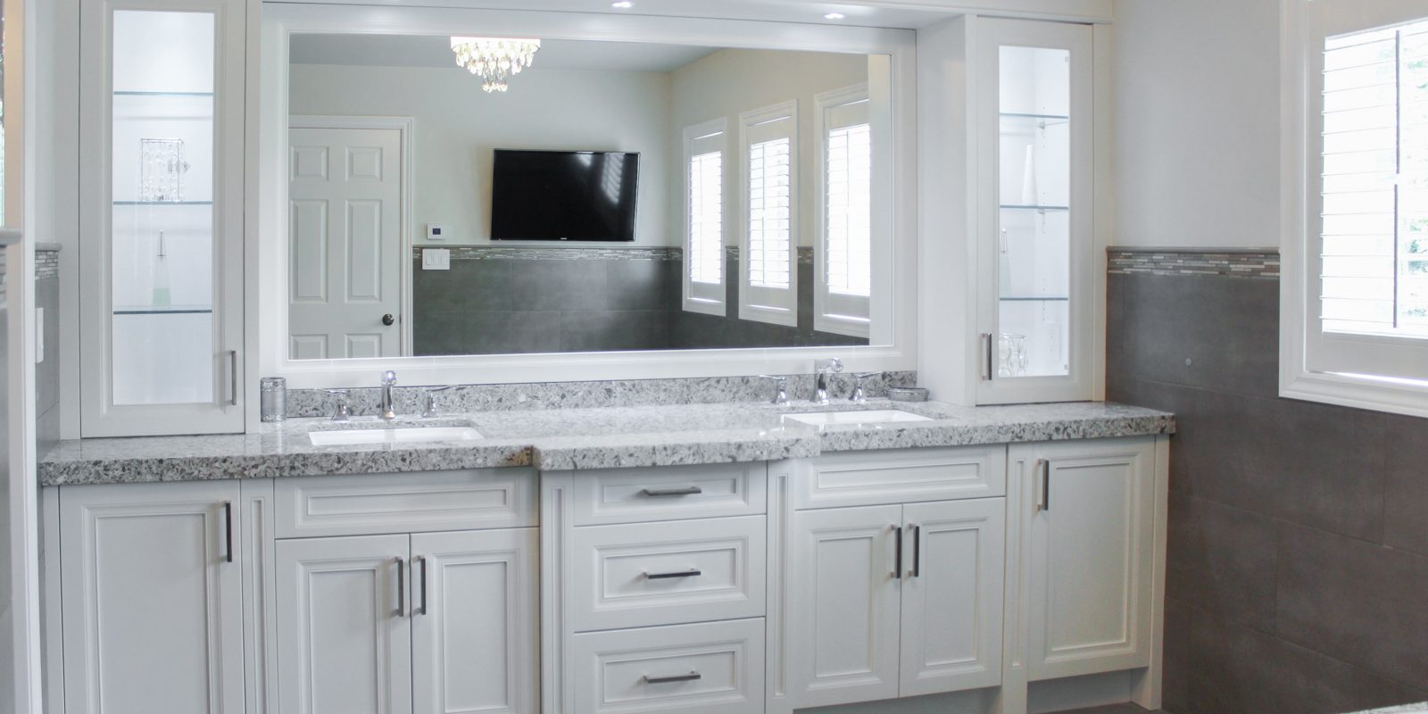 usersFfed afe da afffacdFlibraryFfed fa b b cfbabfF FullyrenovatedbathroomCdoublesinkvanityCoffwhitepaint A modern white bathroom vanity with double sinks and a large mirror.